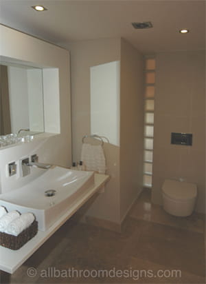 small bathroom with glass bricks